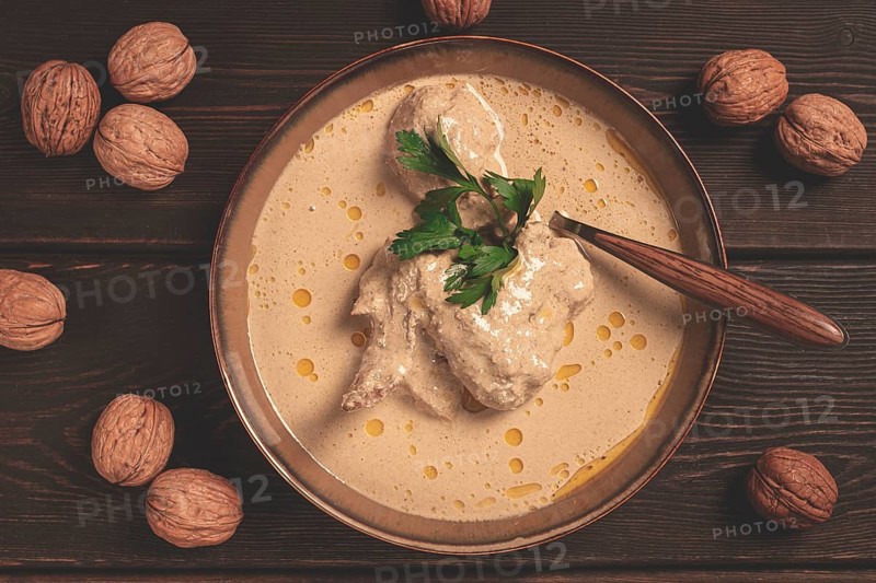 Satsivi, Georgian dish, chicken in nut sauce, cold appetizer, rustic, no people, homemade