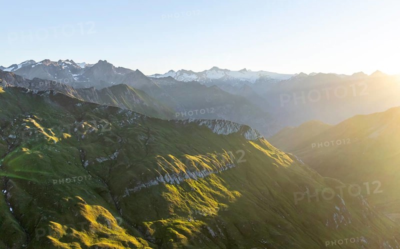Sunrise, alpine panorama, aerial view with summit of Großvenediger, Venediger Group and Lasörling Group, Hohe Tauern, Austria