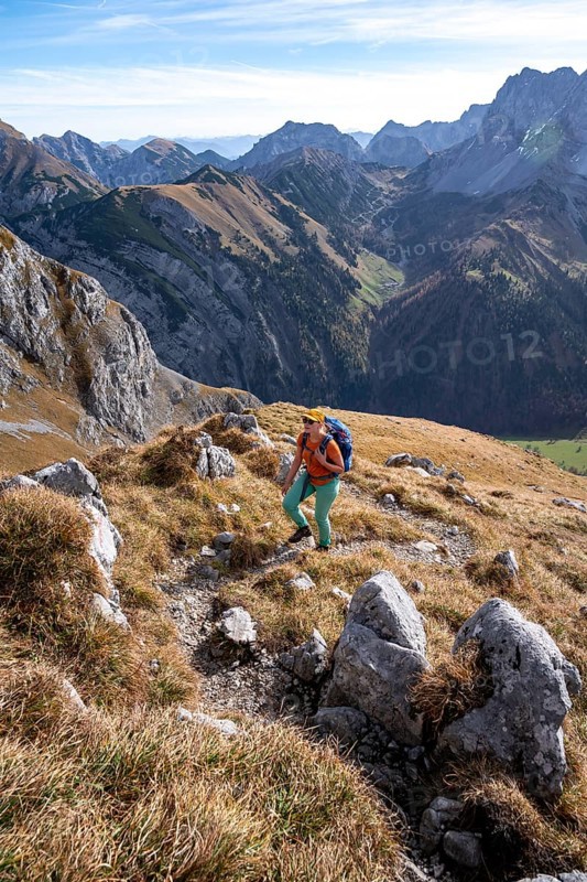 Female hiker on hiking trail, hiking to Gamsjoch, down the Ahornboden valley, eastern Karwendel, Tyrol, Austria