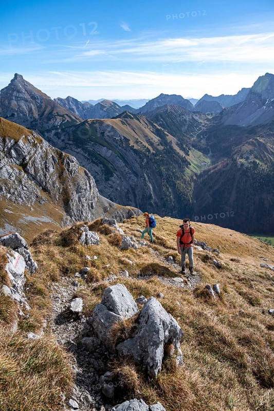 Two hikers on hiking trail, hiking to Gamsjoch, down the Ahornboden valley, eastern Karwendel, Tyrol, Austria