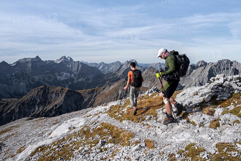 Two hikers on the summit ridge of Gamsjoch, eastern Karwendel, Tyrol, Austria