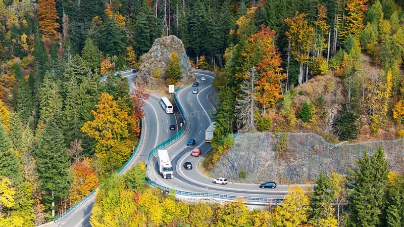 Kreuzfelsenkurve, Bundesstraße 31. The most spectacular curve in the Black Forest in autumn. Drone photo. Breitnau, Baden-Württemberg, Germany