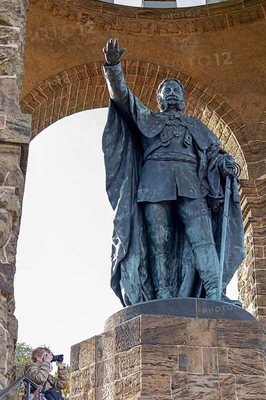 Woman photographed, statue, Kaiser Wilhelm Memorial, Porta Westfalica, North Rhine-Westphalia, Germany