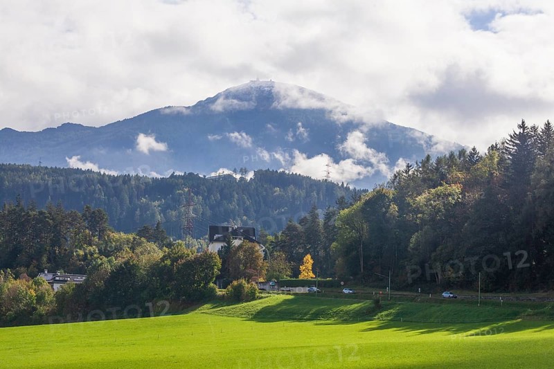 Patscherkofel mountain with road in autumn, Innsbruck, Tyrol, Austria