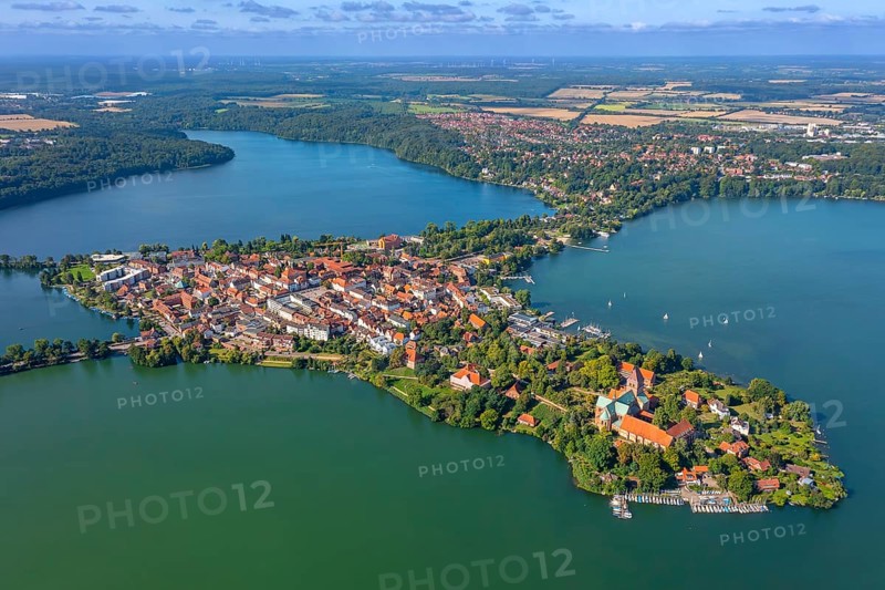 Aerial view over Ratzeburger Dom, late Brick Romanesque cathedral in the town Ratzeburg and the Ratzeburger See in summer, Schleswig-Holstein, Germany