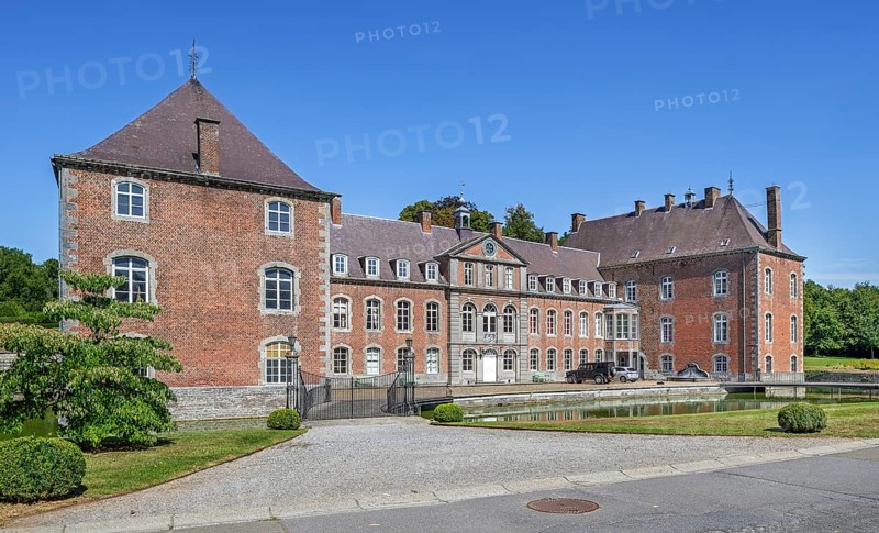16th century Classicist Château de Franc-Waret in Louis XV style, moated castle in the village Fernelmont, province of Namur, Wallonia, Belgium