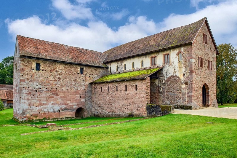 View of Einhard's Basilica historic church building from the 9th century with former main portal main entrance on the right, Steinbach, Michelstadt, Odenwald, Hesse, Germany