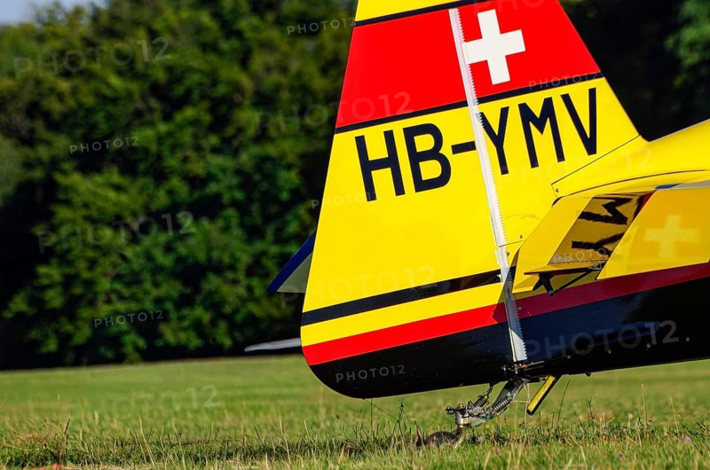 A Votec 351 sport aircraft from Swiss MSW Aviation AG with registration HB-YMV during a flight demonstration as part of an air show on Rossfeld in Metzingen-Glems, Baden-Württemberg, Germany, for editorial use only, digitally reworked