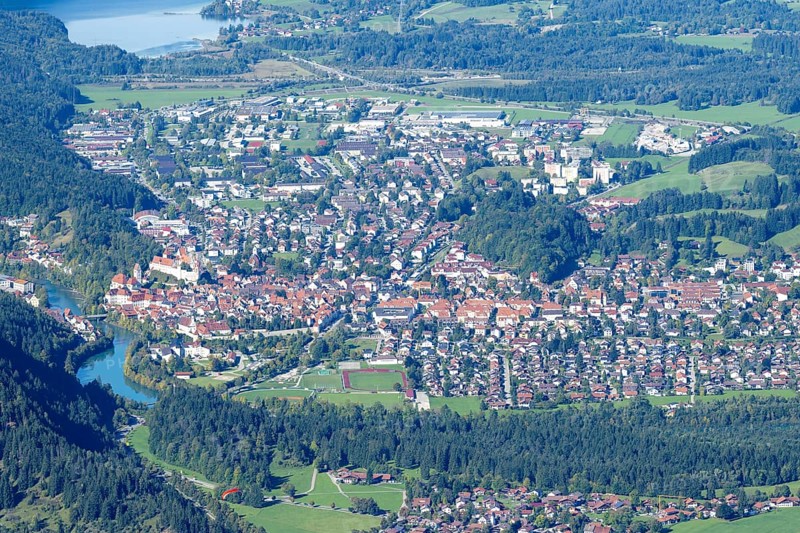 Panorama from Tegelberg, 1881m, on Füssen with historic old town, the Lech and behind it the Weissensee, Ostallgäu, Allgäu, Bavaria, Germany