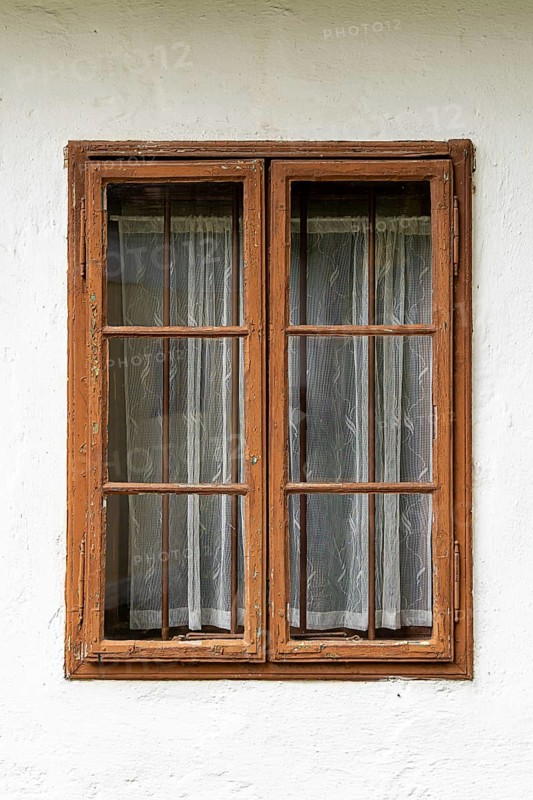 Brown wooden frame with curtains in a white house, Weinviertel Lower Austria Austria