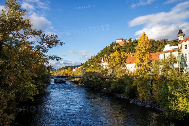 Murinsel, behind Schlossberg with clock tower, Graz, Styria, Austria