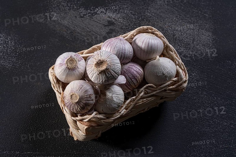 Elephant garlic on dark kitchen plate