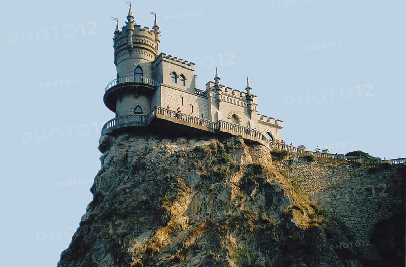The mysterious Swallow's Nest Castle is a famous tourist attraction and a signature sight of the Southern Coast of Crimea for many travelers. The palace situated on Cape Ai-Todor, atop the 40-meter-high Aurora Cliff, towering over the Black Sea, it was built in the Gothic style between 1889 and 1912. It belonged to wealthy noble families of the Russian Empire. Gaspra, Crimea