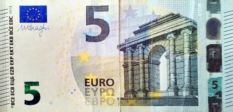 A 5 euro paper banknote issued by the European Central Bank. This banknote is used in financial transactions within the economies of the European Union