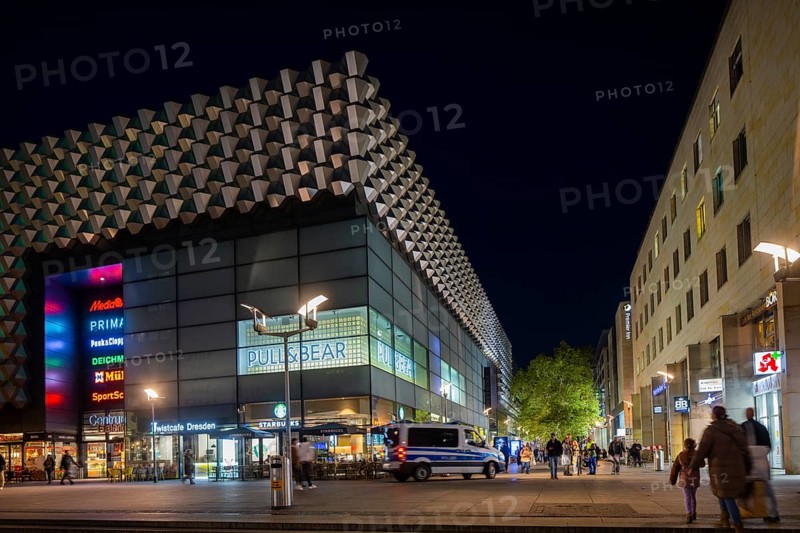 Prager Straße in the evening with the Centrum Gallery with police patrol, Dresden, Saxony, Germany