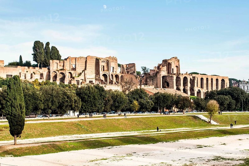 Circus Maximus, an ancient Roman chariot racing stadium and mass entertainment venue, and Domus Augustana in the background. Rome, Province of Rome, Italy