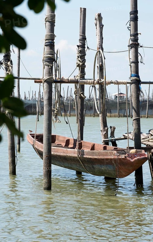 Thailand, Songkhla, Koh Yo, Aquacultural farm, Freshwater fish farming, Long-tailed boat out of water
