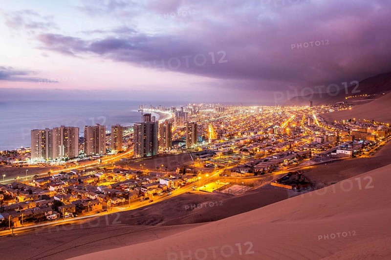 City of Iquique at dusk viewed from Cerro Dragon. Iquique, Tarapaca Region, Chile. 19.11.15