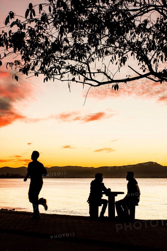 Sidewalk of Beira Mar Norte Avenue at sunset. Florianopolis, Santa Catarina, Brazil