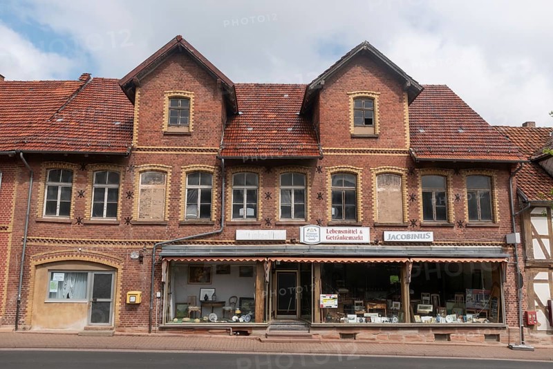 Antiques, former grocery store, business abandonment, brick building, Kleinalmerode, municipality, Geo-Naturpark Frau Holle Land, Bad Sooden-Allendorf, Hesse, Germany