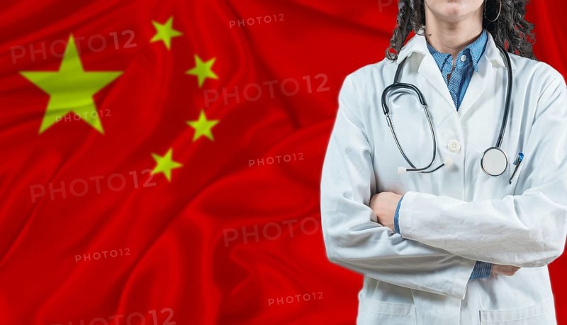 Medical professional on Chinese flag. Healthcare and wellness in China, Concept