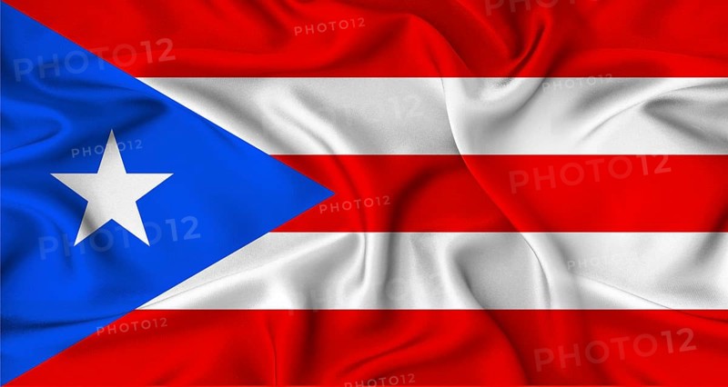 Realistic Puerto Rico flag waving. Close up of flag of Puerto Rico with cloth texture
