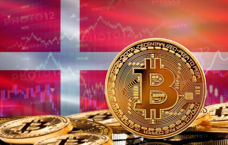 Investors in cryptocurrency and Blockchain Technology in Denmark, Concept. Bitcoin with Denmark flag in the background