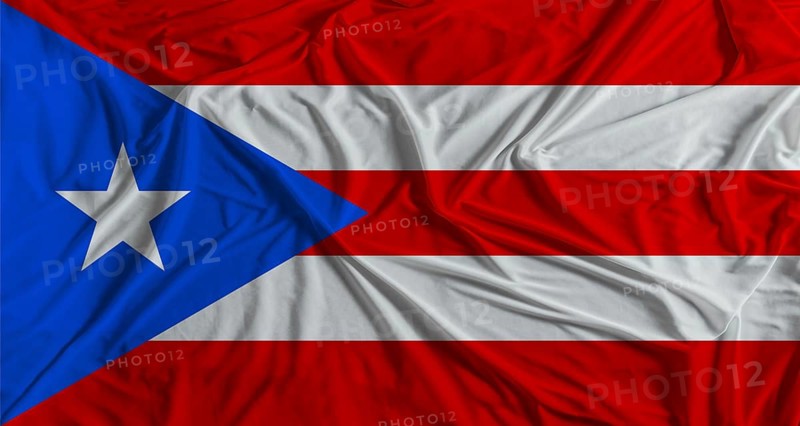 Puerto Rican flag with fabric texture background. National flag of Puerto Rico