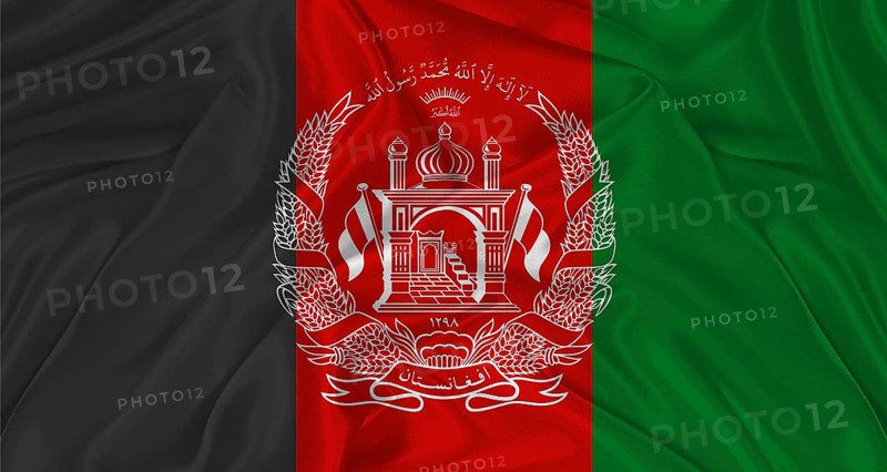 Flag of Afghanistan with cloth texture. Close up of Afghanistan flag waving