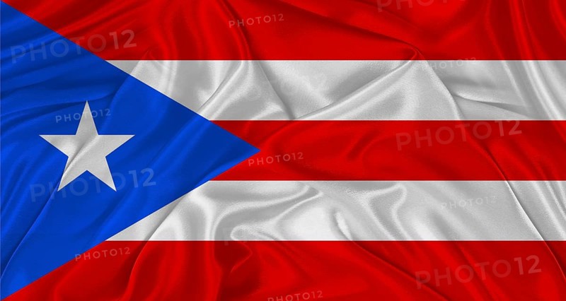 Flag of Puerto Rico with cloth texture. Close up of Puerto Rico flag waving