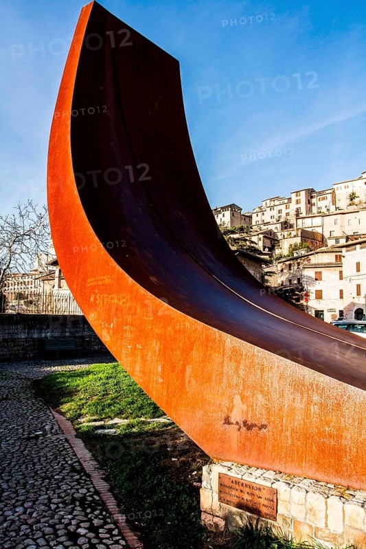 Sculpture in Piazza San Pietro, called Ascension. Assisi, Province of Perugia, Italy. 22.12.2012
