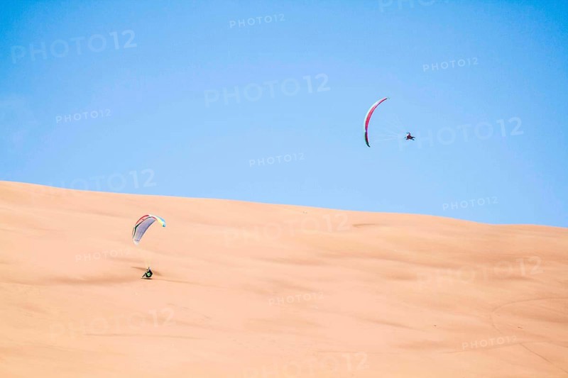 Paragliding at Atacama Desert. Iquique, Tarapaca Region, Chile