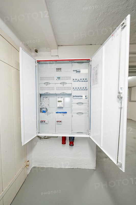 Open electrical distributor in a clean cellar room, modern and well-arranged, house renovation, energy renovation, Metzingen, Germany