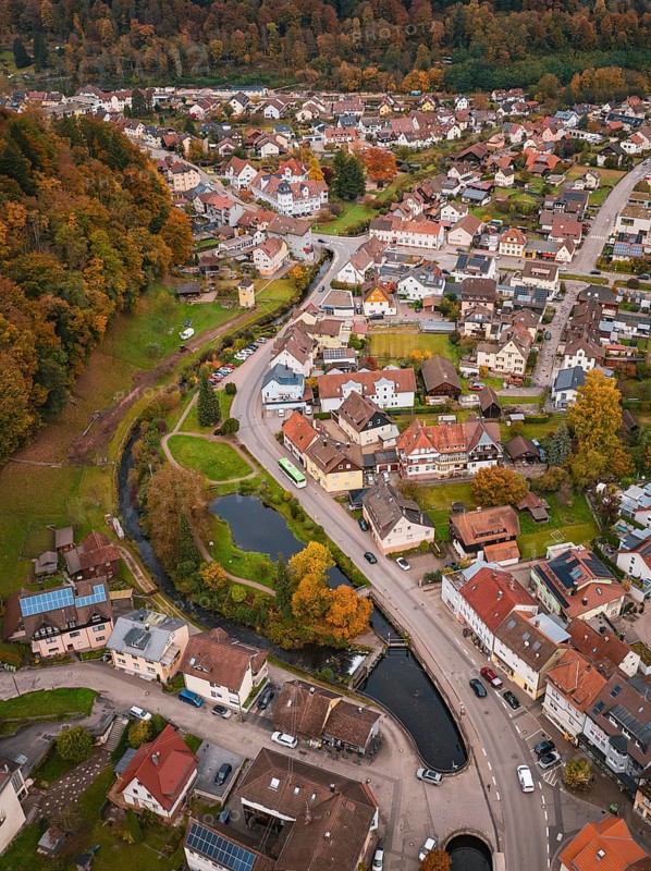 Aerial view of a city with river course and park area, nestled in autumn surroundings, Calmbach, Bad Wildbad, Black Forest, Germany