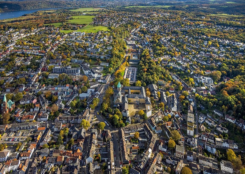Aerial view, Catholic Basilica of St. Ludgerus and Folkwang University of Arts, St. Josef Hospital Essen-Werden GmbH, Mariengymnasium and residential area on Brückstraße, autumn trees, Werden, Essen, Ruhr region, North Rhine-Westphalia, Germany, place of worship, construction area, construction project, construction site, education, educational institution, DE, Essen-South, Europe, health care, religious community, God house, high school, holy place, college, hospital, church, parish, church tower, clinic, denomination, hospital, Hospital, teaching institute, aerial view, aerial photography, aerial photography, medical facility, medical aid, religion, place of worship, school center, overview, university, birds-eyes view, overview, medical care