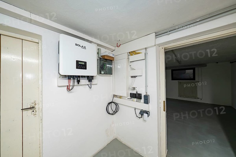 Technical room in the basement with Solax inverter and photovoltaic system installations, house renovation, climate renovation, Metzingen, Germany