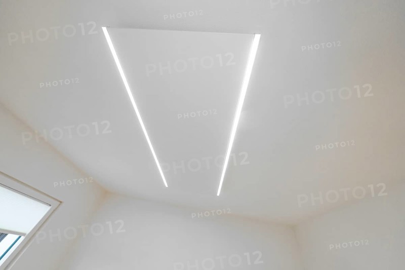 Bright ceiling with two parallel LED light strips, minimalistic design, house renovation, climate renovation, Metzingen, Germany