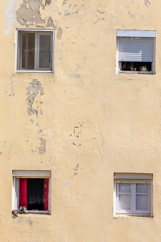 An old historic town. The window front on the promenade shows its former glory of Cadiz, Andalusia, Atlantic, Spain