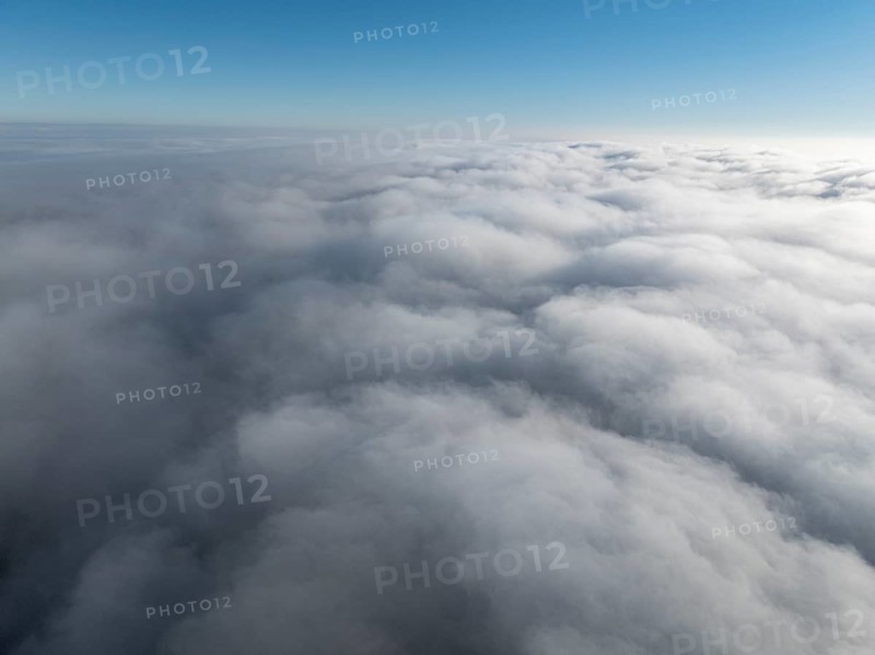 Aerial view, clouds of fog, fog cover seen from above, with clear blue sky, Germany
