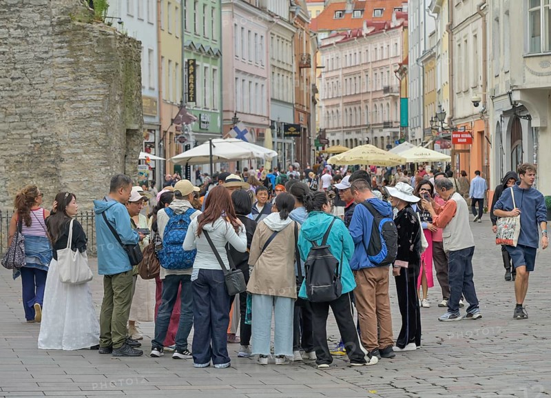 Chinese tourists, city tour, Old Town, Tallinn, Estonia