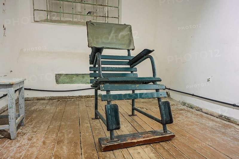 Chair, cellar, exhibition, former KGB headquarters with prison, Pagari 1, Old Town, Tallinn, Estonia