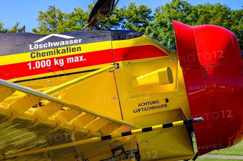 A PZL-106 AR Kruk agricultural aircraft with the registration D-FOAB and the original registration DDR-TAB as well as in the original colors of the company Agrarflug of Interflug as part of an air show on Rossfeld in Metzingen-Glems, Baden-Württemberg, Germany, for editorial use only