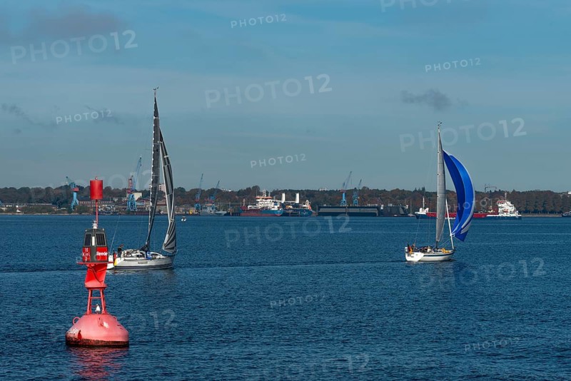 State capital Kiel, industry and shipyards in the Friedrichsort district, LINDENAU Werft GmbH, dock, cranes, sailboats, red buoy with solar panels, economy, industry, Schleswig-Holstein, Germany