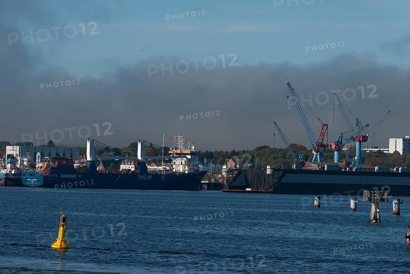 State capital Kiel, industry and shipyards in the Friedrichsort district, LINDENAU Werft GmbH, hall, cranes, economy, industry, yellow buoy with solar modules, restricted area, Schleswig-Holstein, Germany