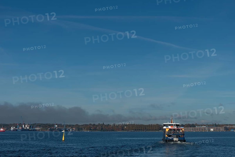 State capital Kiel, industry and shipyards in the Friedrichsort district, LINDENAU Werft GmbH. dock, liner, restricted area, yellow buoy with solar panels, economy, industry, Schleswig-Holstein, Germany