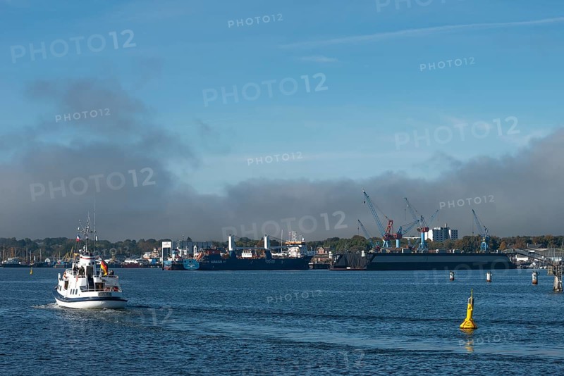 State capital Kiel, industry and shipyards in the Friedrichsort district, LINDENAU Werft GmbH, dock, cranes, conveyor ship, economy, industry, yellow buoy with solar modules, restricted area, Schleswig-Holstein, Germany
