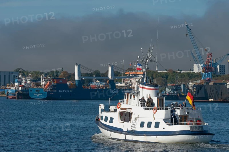 State capital Kiel, industry and shipyards in the Friedrichsort district, LINDENAU Werft GmbH, dock, cranes, conveyor ship, economy, industry, Germany flag, Schleswig-Holstein, Germany