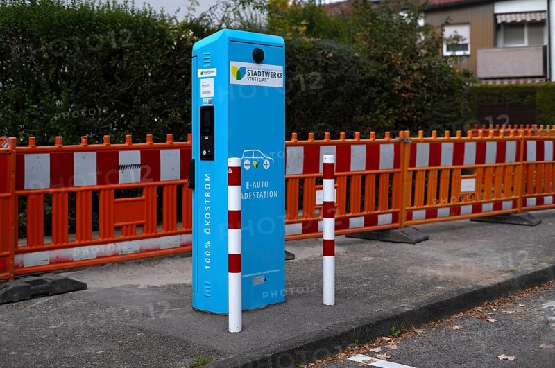 Parking lot with gas pump, EnBW charging station for electric cars, charging station, e-mobility, empty, free, unused, without e-car, pictogram, logo, construction site behind it, Stuttgart, Baden-Württemberg, Germany