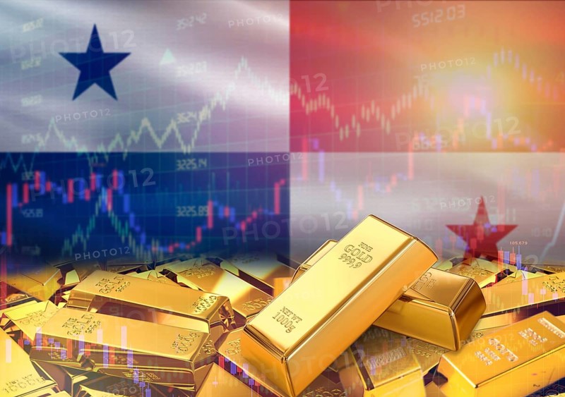 Gold bars on Panama flag in background. Gold bars stacked on Panamanian flag. Concept of Panama gold reserves