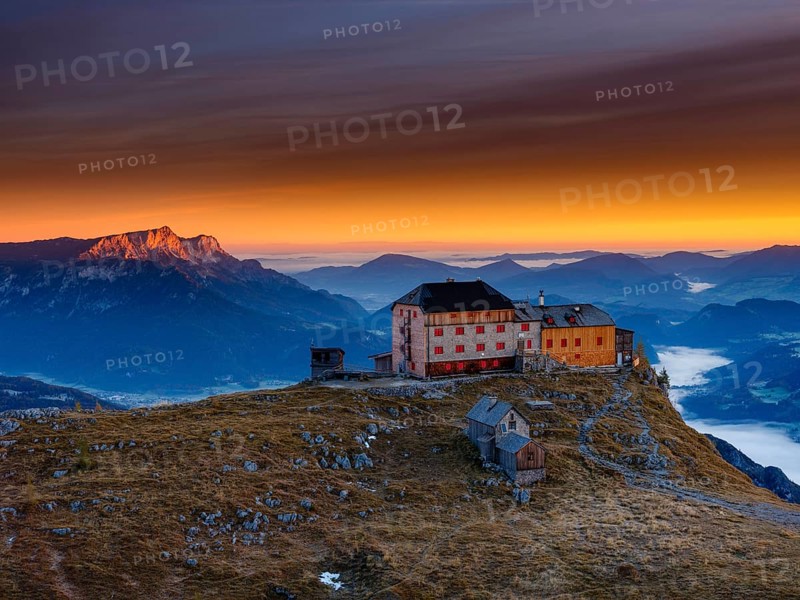 Watzmannhaus at sunrise, fog in the valley, Untersberg on the left in first sunlight, Berchtesgaden National Park, Schönau am Königssee, Berchtesgadener Land, Upper Bavaria, Germany